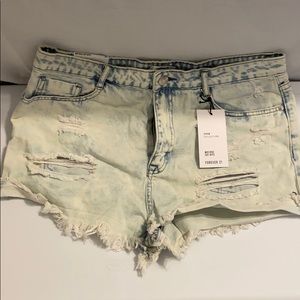 Light Denim Distressed Mid Rise Jean shorts